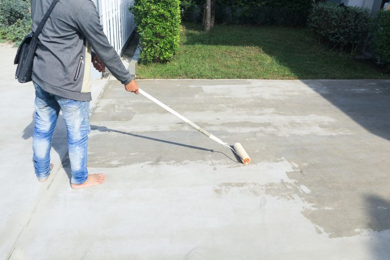 Local Driveway Cement Resurfacing pros at work